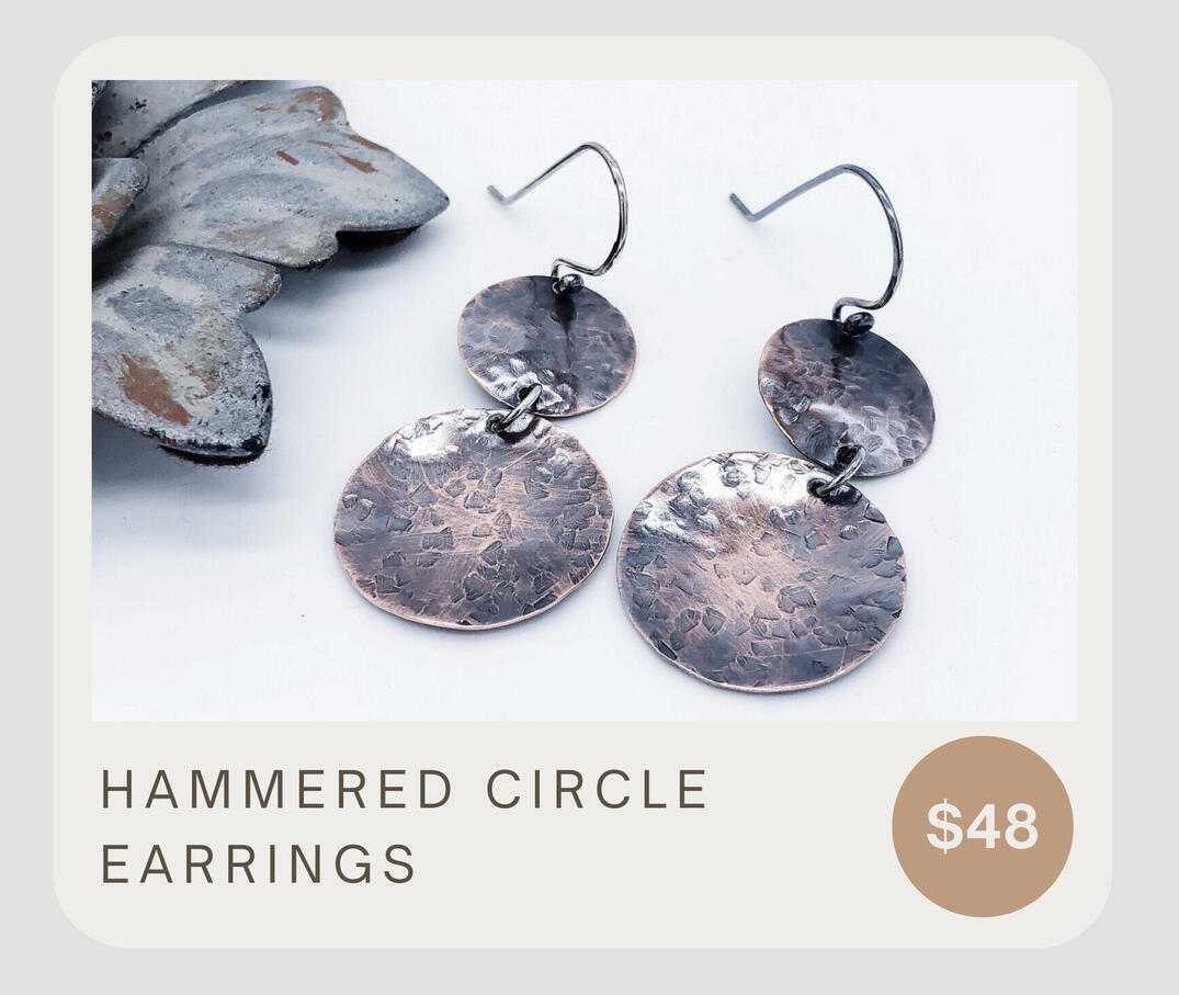 These tribal copper disc earrings hang from handmade 925 sterling silver ear wires. Eye-catching textures on each disc are sure to make you feel adventurous! These dangle about 2 inches from top to bottom & the discs are about 5/8 & 7/8 inches in diameter.