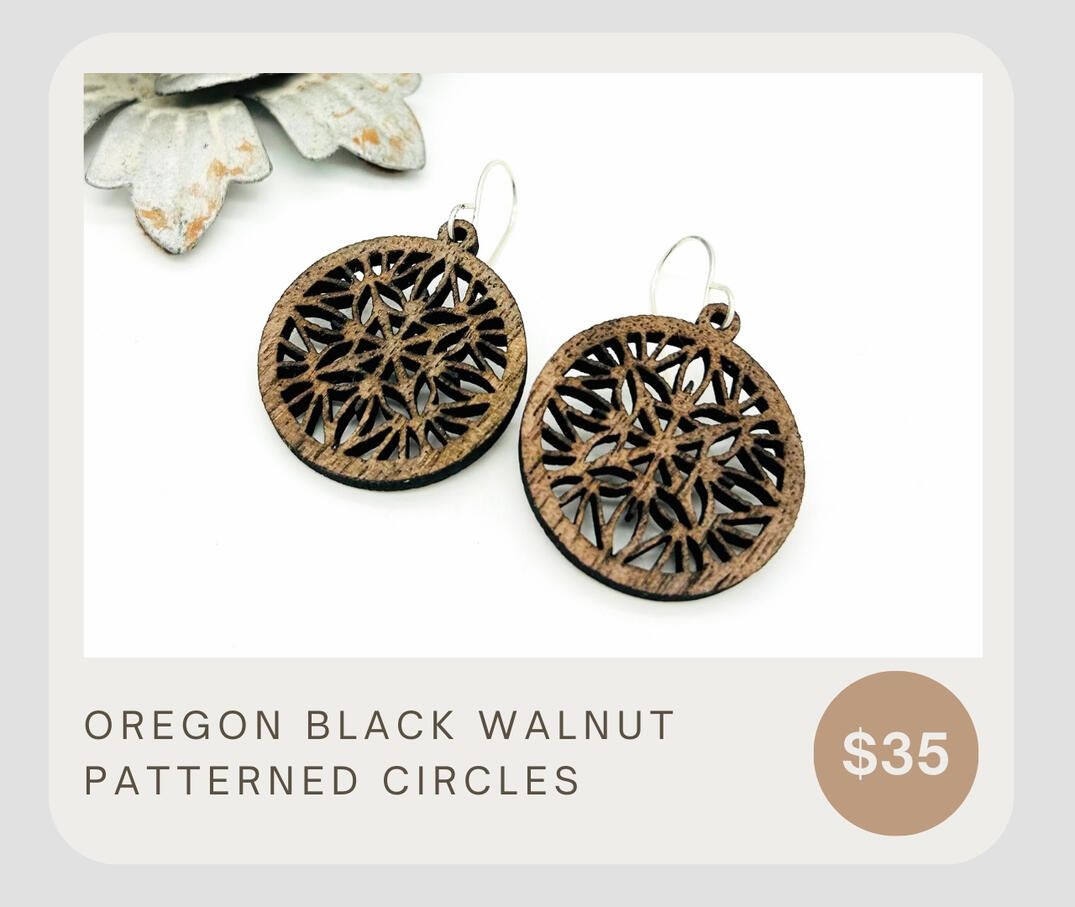 Gorgeous Oregon Black Walnut lightweight patterned dangle earrings. The perfect way to add a bit of warmth to your outfit. These circles are about 1 1/4" wide.