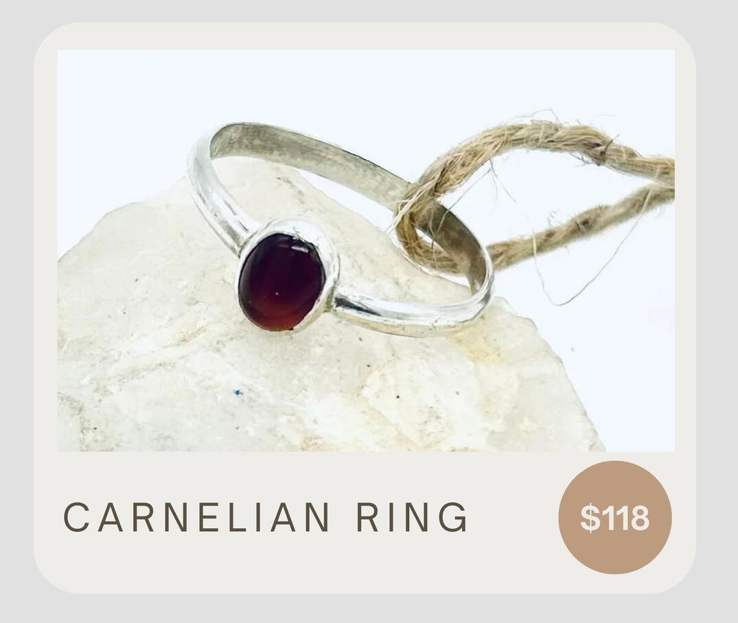 A simple yet stunning ring made from recycled sterling silver featuring a fine silver bezel & Carnelian gemstone. This is a one of a kind piece.